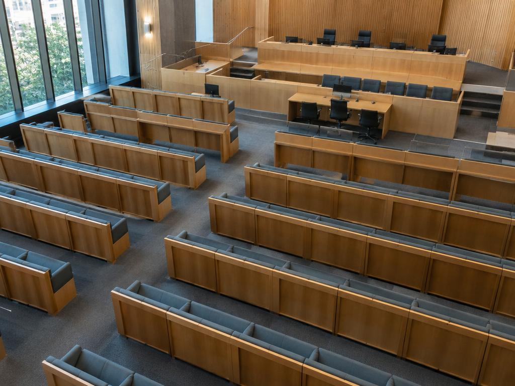 Rows of seating in a contemporary courtroom